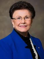Judy Lowe, CEO of the Tucson Association of Realtors, smiling in professional attire.