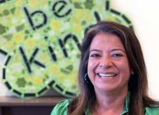 The Science of Kindness: Ben’s Bells and Its Lasting Impact on Tucson Helen Gomez smiling in front of the Ben’s Bells logo.