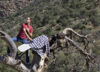 Kieran McGann Takes Extreme Ironing to New Heights as Ironing Man, AKA Tony Starch Kieran McGann Takes Extreme Ironing to New Heights as Ironing Man, AKA Tony Starch